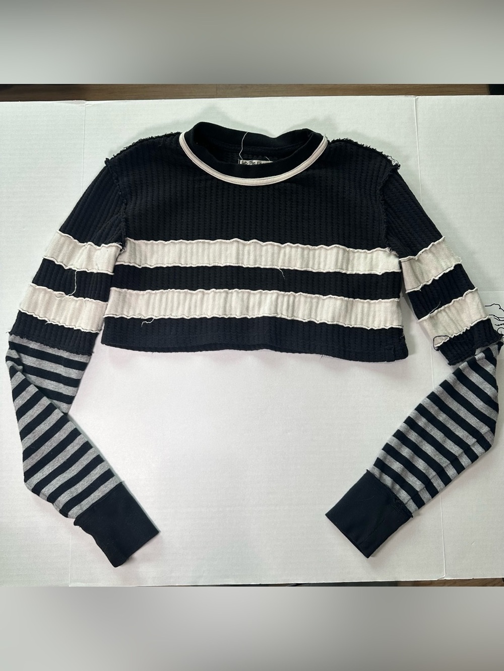 We The Free Black & Cream Striped Cropped Knit Top